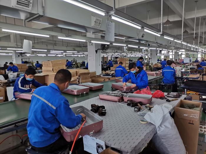 Roka Luggage busy assembling line and hard-working staffs